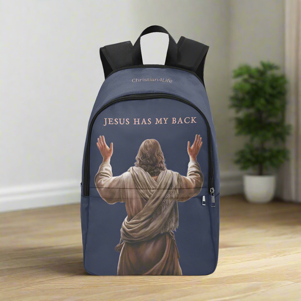 Backpack with 'Jesus Has My Back' text and image of Jesus on a wooden floor.