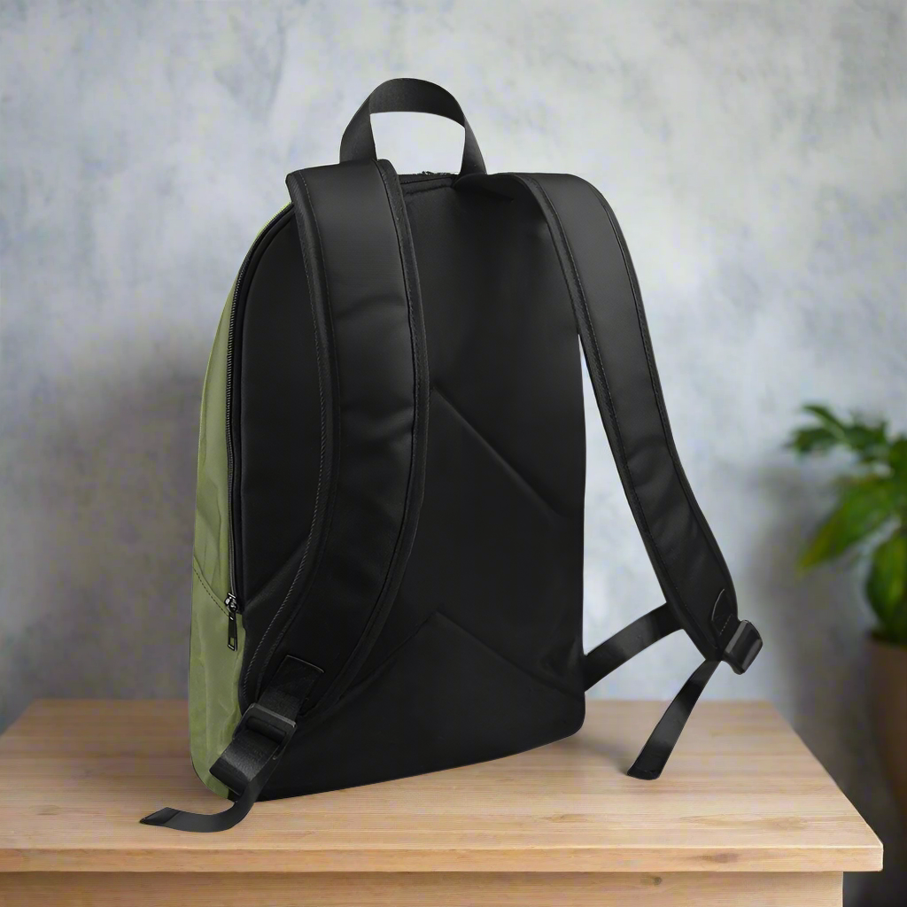 Black and green backpack on a white background