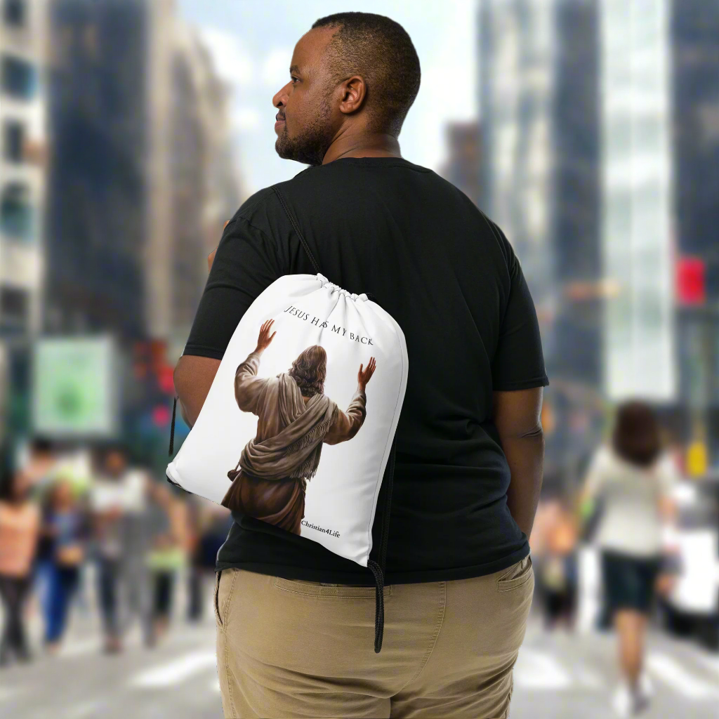 ’Jesus Has My Back’ Drawstring bag 15″ × 17″ (white) - Bags