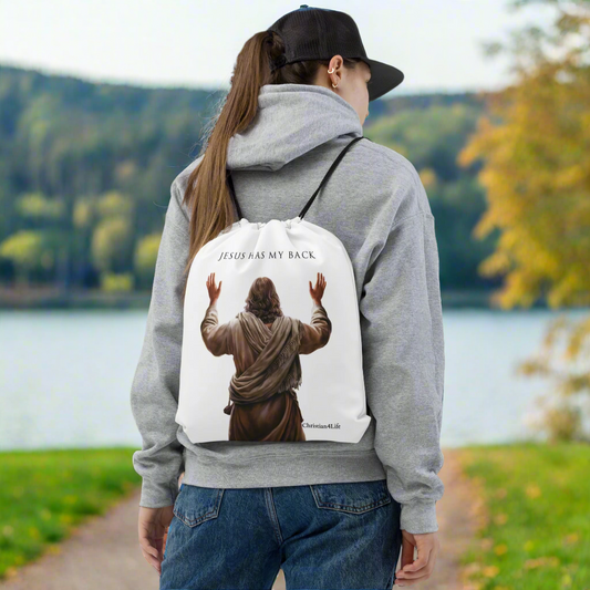 ’Jesus Has My Back’ Drawstring bag 15″ × 17″ (white) - Bags