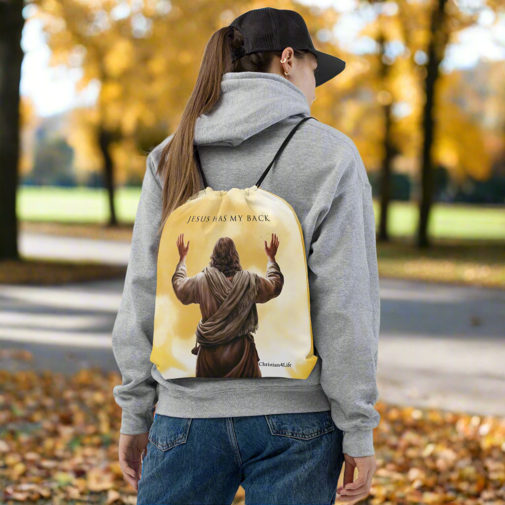 ’Jesus Has My Back’ Drawstring bag 15″ × 17″ (yellow tie-dye) - Bags