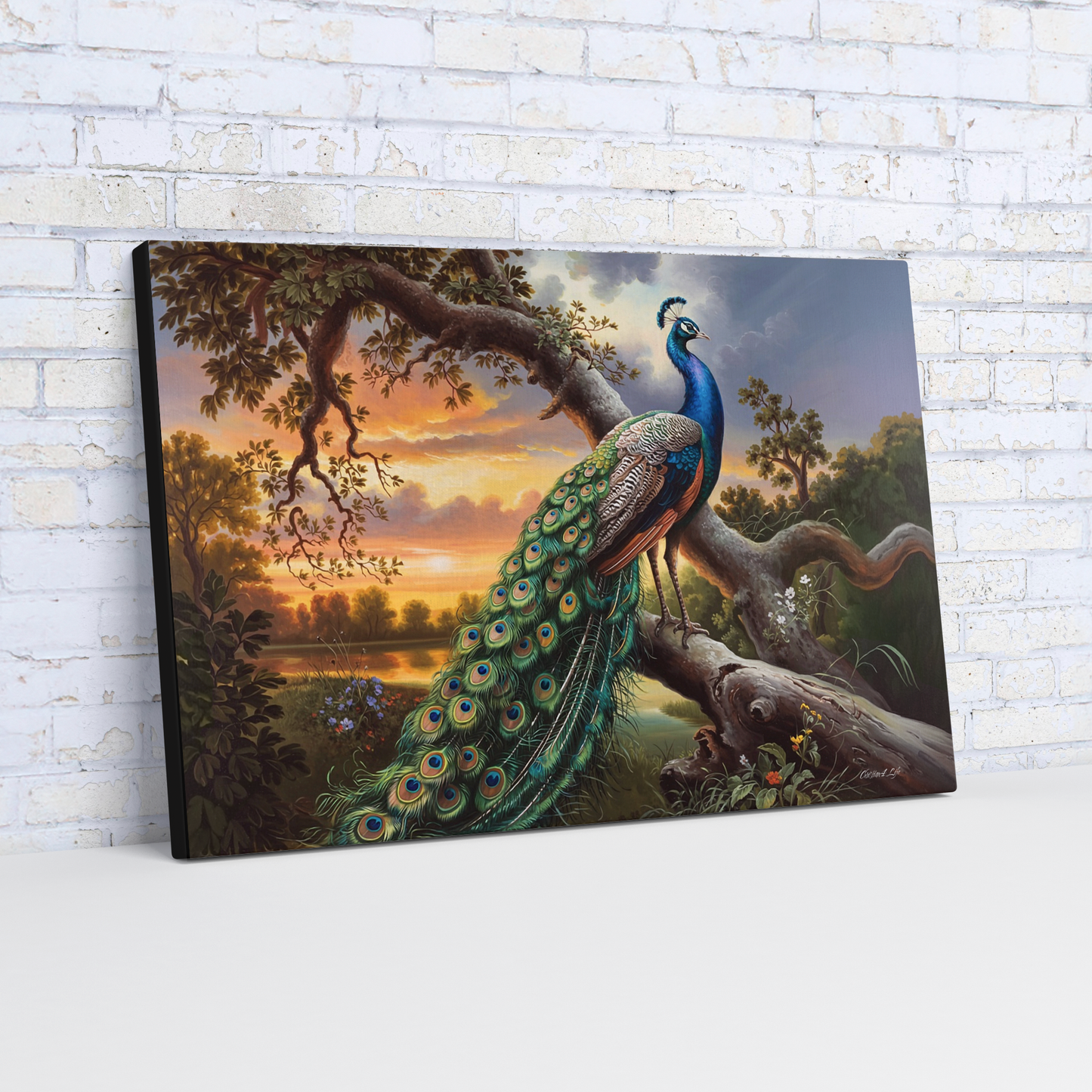 Canvas print of a peacock on a branch with a sunset landscape, against a white brick wall.