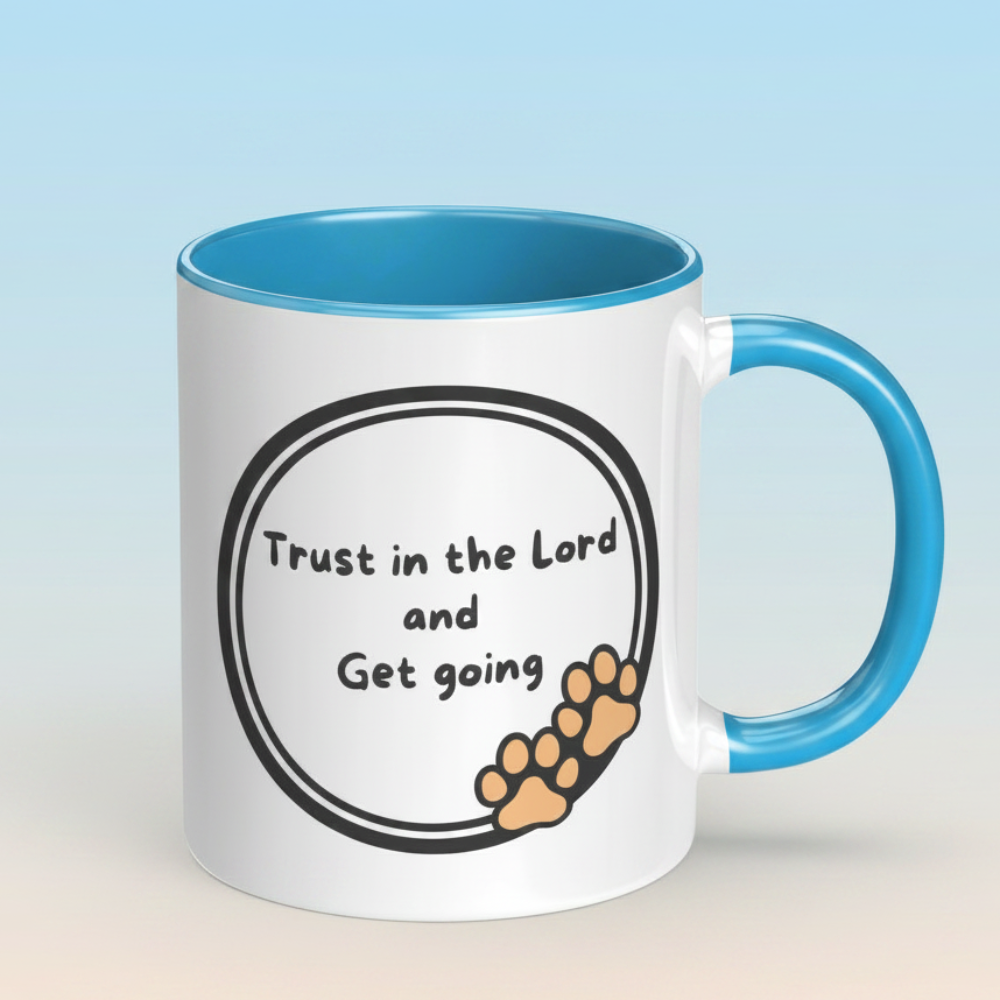 White mug with blue interior and handle featuring motivational text and paw prints on a light gradient background