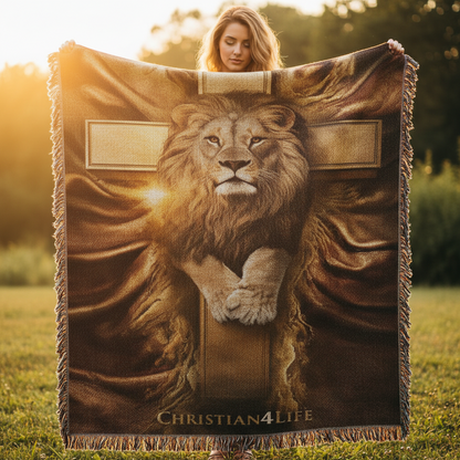 Person holding a blanket with a lion and cross design and 'Christian4Life' text in an outdoor setting.