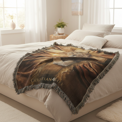 Blanket with a lion and cross design on a bed in a bright bedroom