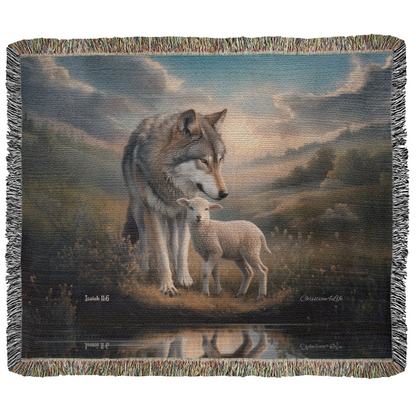 Woven blanket with a wolf and lamb design in a landscape setting