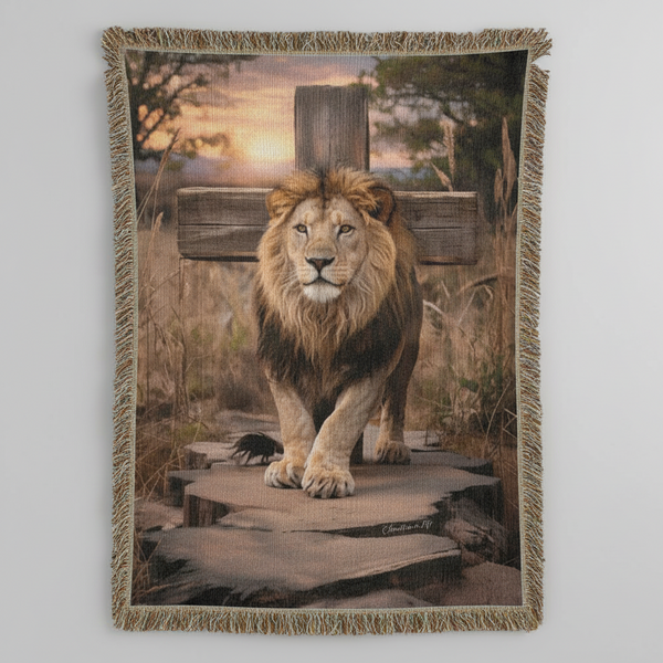 Blanket with a lion design on a wooden platform, set against a natural landscape.
