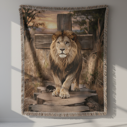 Woven blanket with a lion design on a plain background