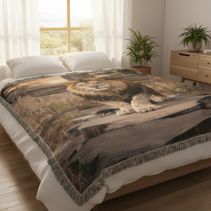 Bed with a lion-themed blanket in a bright bedroom