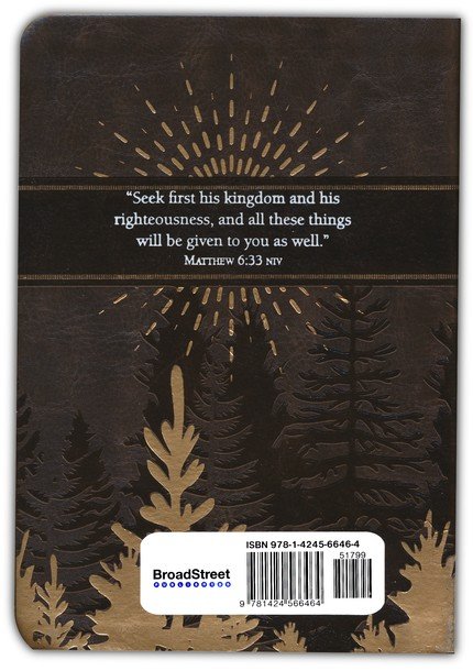 Back cover of a book with a quote and tree design