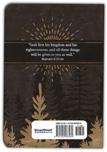 Back cover of a book with a quote and tree design
