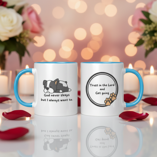 Two mugs with printed designs on a decorative background with flowers and candles.